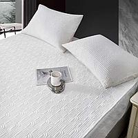 Наматрасник из хлопка на резинке размера 180х200 см.