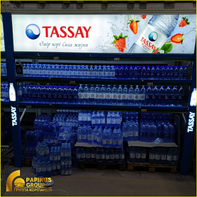 Оформление POSM световыми коробами для торговой марки TASSAY