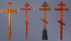 Деревянные надмогильные кресты, покрытые лаком