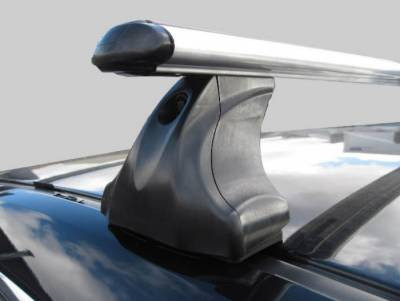 Багажник Atlant для гладкой крыши с креплением в штатные места, аэродинамические дуги, опора E - фото 1 - id-p1411722