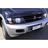 Защита фар Mitsubishi Pajero 2000-2006 с чёрным рисунком