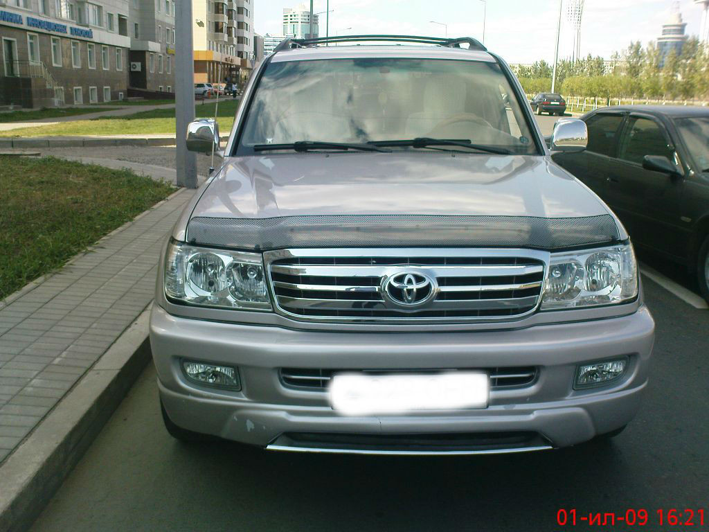 Мухобойка (дефлектор капота) Toyota Land Cruiser 100 1998-2007 (Carbon) - фото 1 - id-p28785109