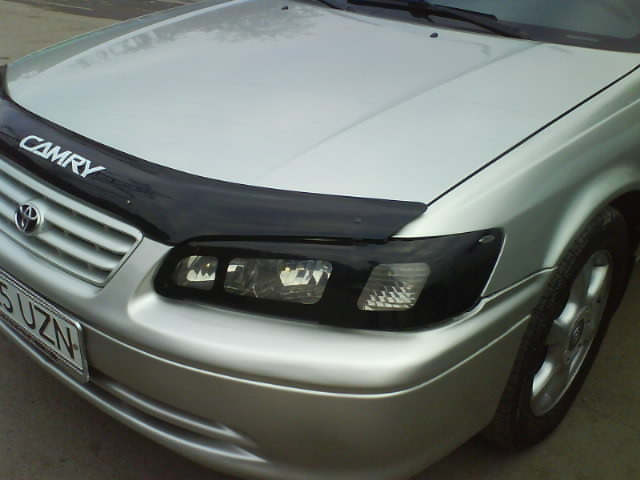 Защита фар Toyota Camry 25 2000-2001 с чёрным рисунком - фото 1 - id-p28785916