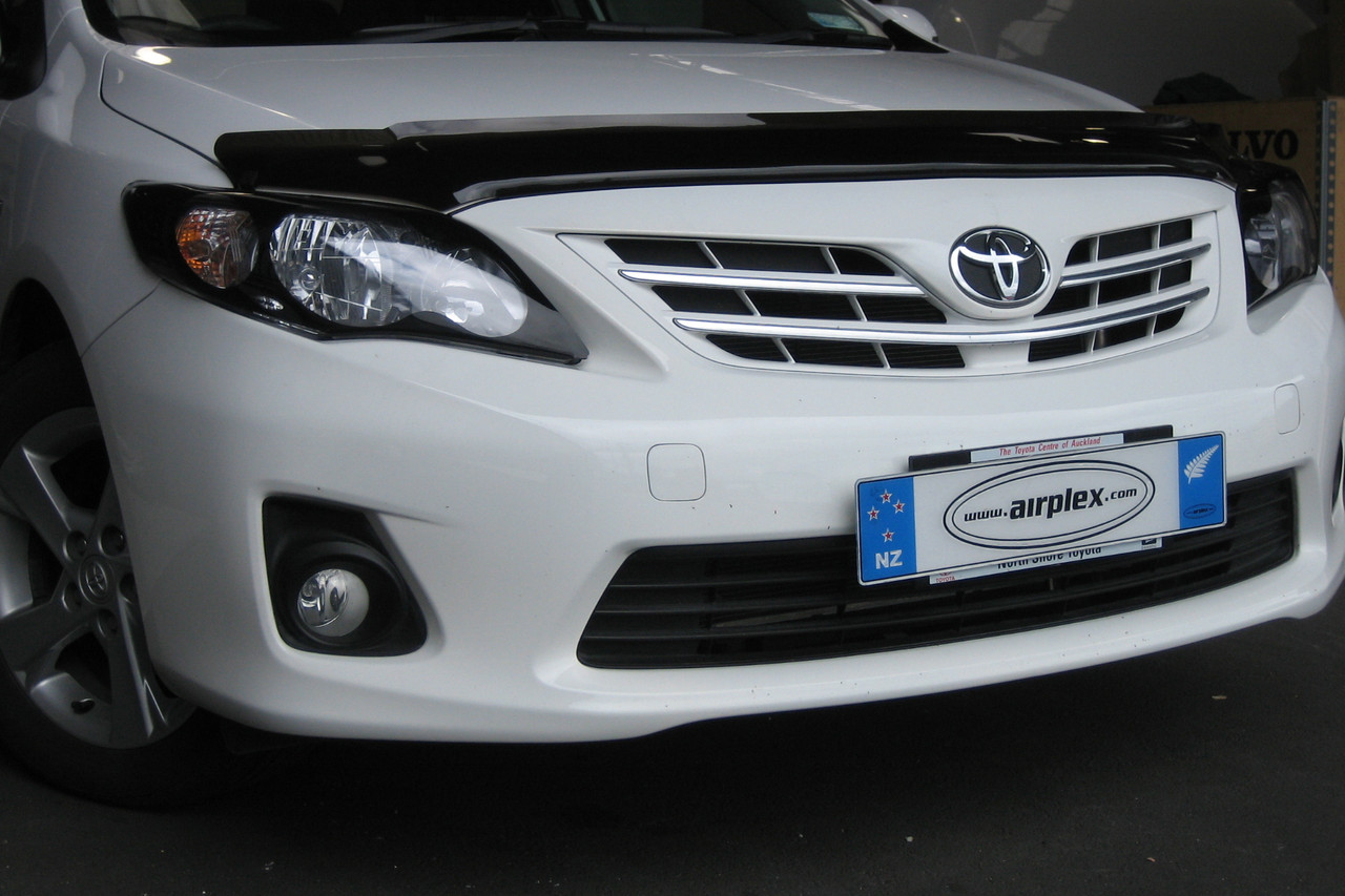 Защита фар Toyota Corolla 2010-2012 с чёрным рисунком