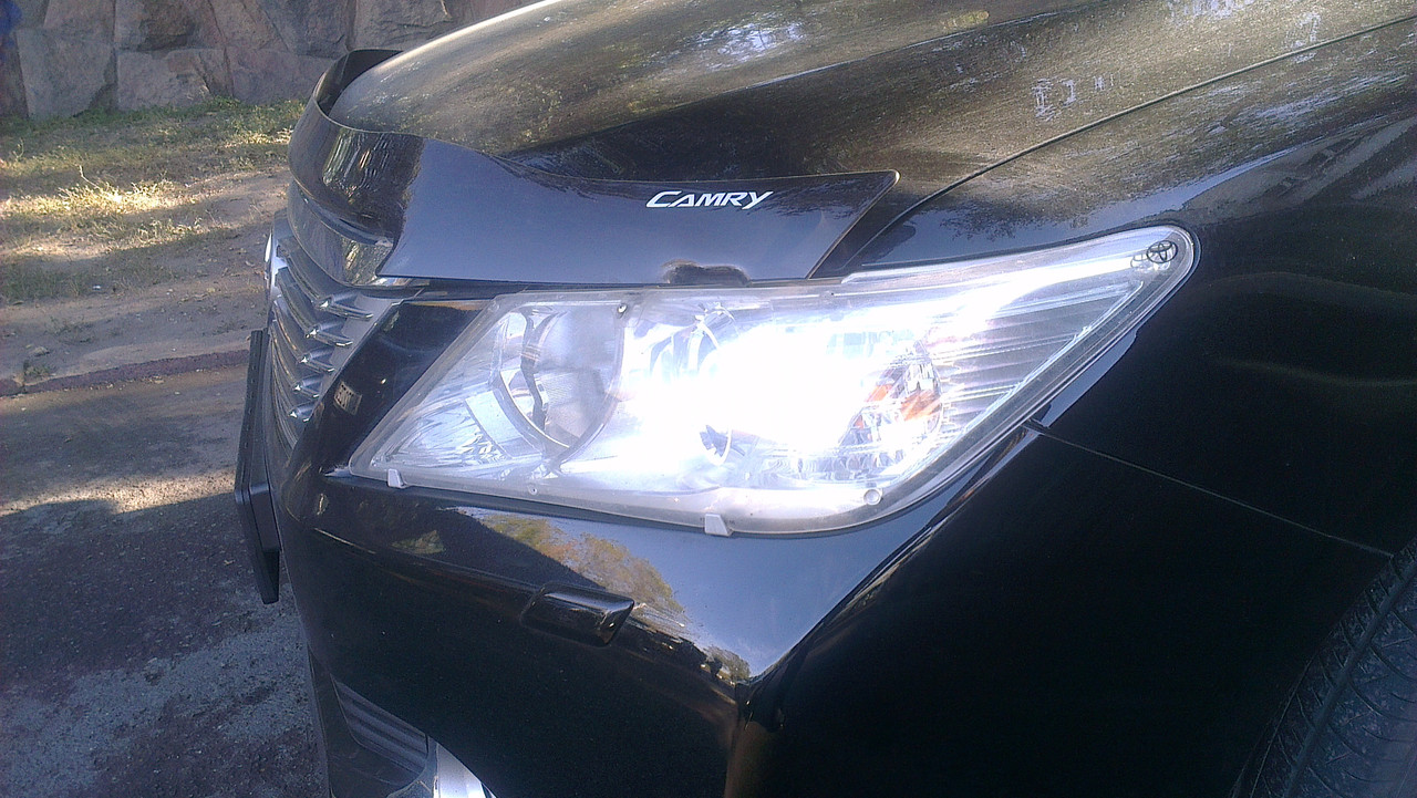 Защита фар Toyota Camry 50 2011-2014 прозрачная OEM с логотипом - фото 1 - id-p36190696