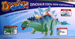 Динозавр игрушка музыкальный и световой модель 1004А 
