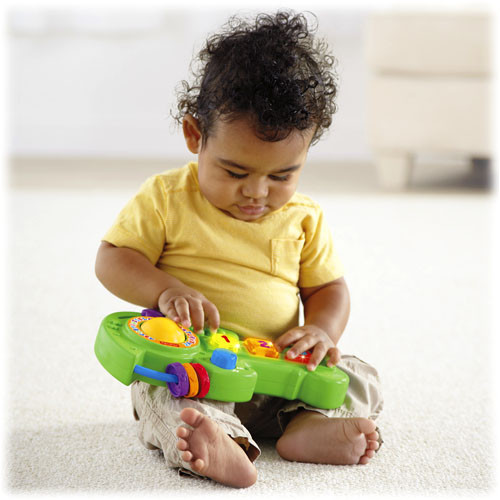 FISHER PRICE:"Смейся и учись" Обучающая музыкальная гитара