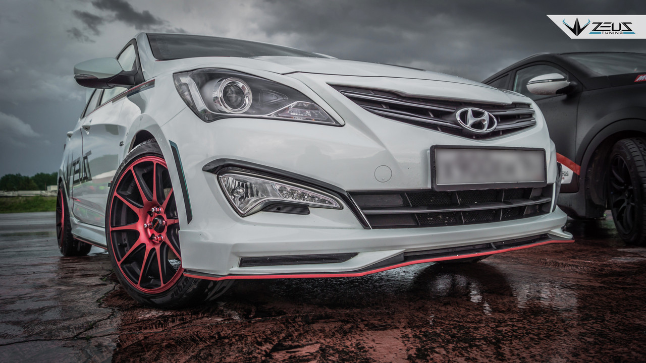 Передняя накладка (юбка) ZEUS на бампер Hyundai Accent (Solaris)