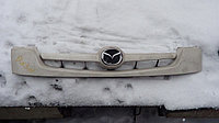 Радиатор торы Mazda Demio