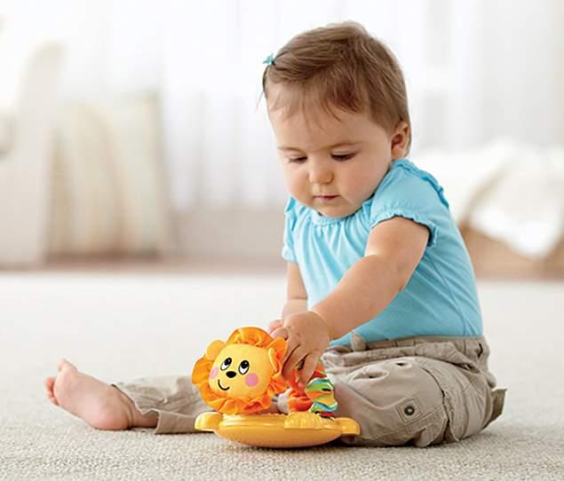 Fisher price Y3631 Интерактивная игрушка.Лев-колокольчик