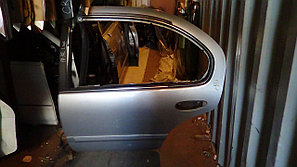 Дверь левая задняя Nissan Cefiro