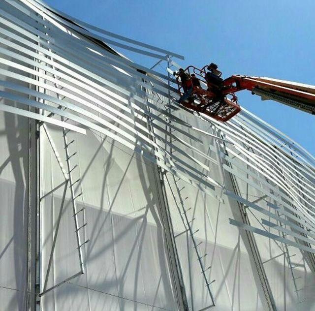 Монтаж фасада на павильоне цирка Дю Солей на Expo 2017  43