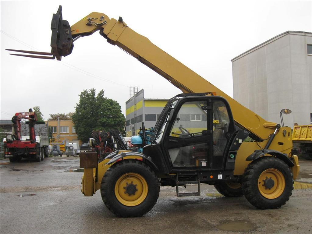 Б/у Телескопический погрузчик Caterpillar TH414