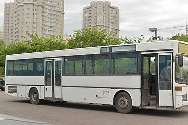 Развозка рабочих на городском автобусе