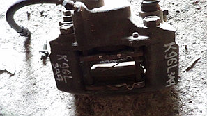 Тормозной суппорт Mitsubish Challenger задний левый