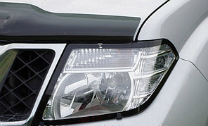 Защита фар EGR Nissan Navara (D40) 2010-2014 с чёрной окантовкой