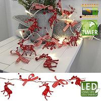 Гирлянда 1,05м теплобелая Олени и банты красные кабель прозрачный 0,5м 726-67